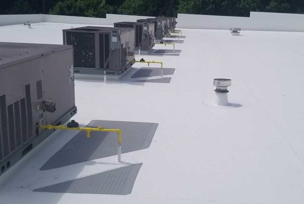 How Commercial Roofing Contractors Save Businesses Money